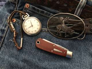 Image for the poem Pocket Watches, Knives and Belt Buckles 