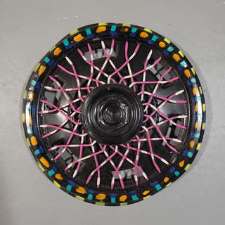 Image for the poem Hubcap Series # 1