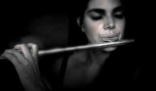 Image for the poem Flute Lips - By Nizana