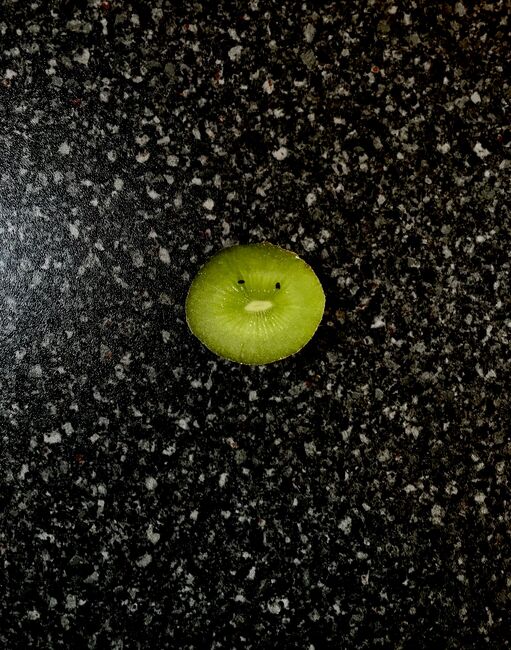 Image for the poem On slicing a Kiwi Fruit 